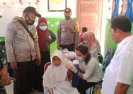 Kapolsek Una Una Pantau Langsung Vaksinasi Untuk Anak Usia 6-11 Tahun di SDN Lebiti