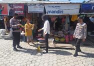 KBO Sat Binmas Polres Touna Bersama Personil Sambangi Pasar Pagi Bailo