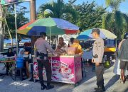 Polsek Ampana Kota Patroli Jalan Kaki di Pasar Takjil Ramadhan